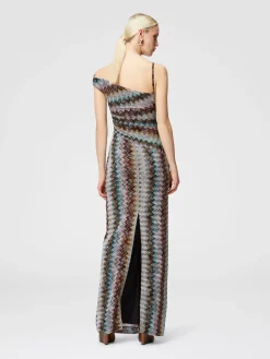 Abito lungo zig zag lamé con scollatura asimmetrica