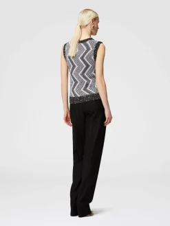 Gilet con macro zig zag e paillettes