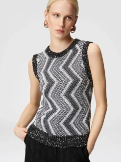 Gilet con macro zig zag e paillettes