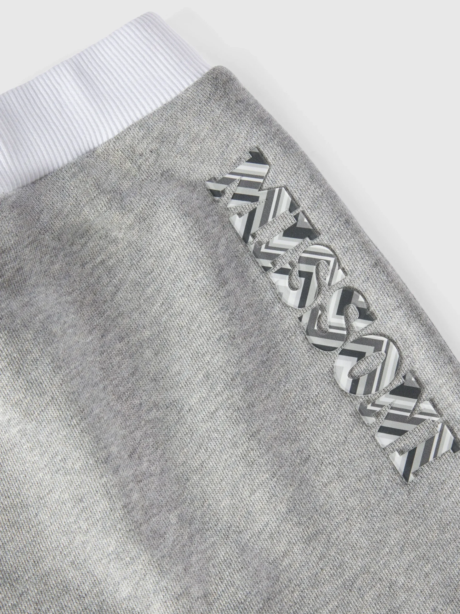 Joggers in cotone con stampa logo a rilievo