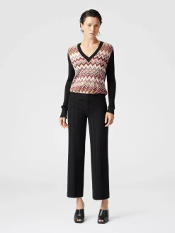 Magli in misto viscosa con inserto chevron e scollo a V