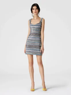 Mini-abitoin maglia lamé con scollatura a cuore