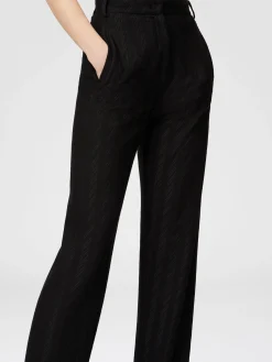 Pantaloni carrot fit motivo zig zag tono su tono