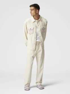 Pantaloni classici in denim con inserti in maglia chevron