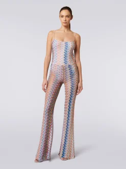Pantaloni con fondo svasato e lurex