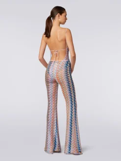 Pantaloni con fondo svasato e lurex