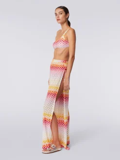 Pantaloni copricostume effetto pizzo con lurex