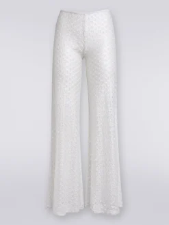Pantaloni copricostume effetto pizzo con fondo svasato