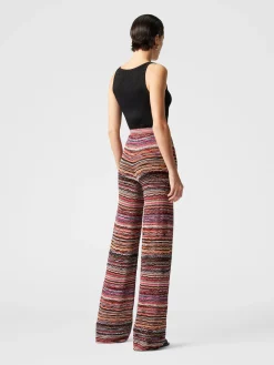 Pantaloni dritti in viscosa goffrata lamé motivo onde