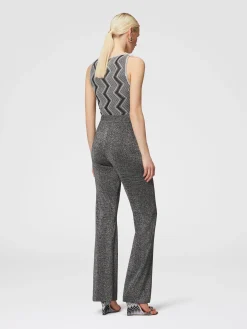 Pantaloni flare in viscosa effetto glitter