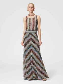 Top smanicato con motivo zig zag fiammato lamé